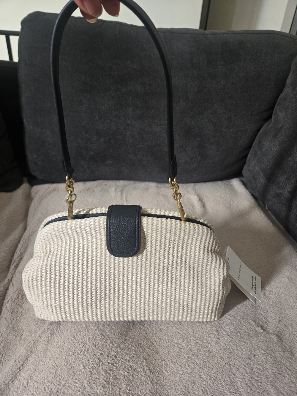 Cream Woven Shoulder Bag with Black Trim and Gold Hardware